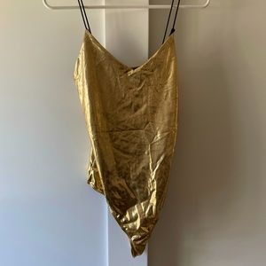 Gold body suit